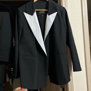 Black and white Tuxedoish pants suit.